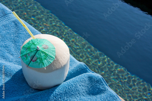 Фотография A Coconut Drink by the Pool