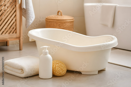 Baby bath tub with towel and sponge
