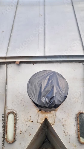 Bottom View of Industrial Metal Silo Hopper with Discharge Valves and Sight Glass Windows