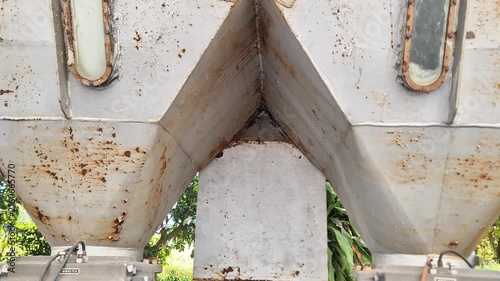 Bottom View of Industrial Metal Silo Hopper with Discharge Valves and Sight Glass Windows