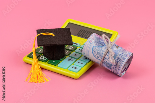 A conceptual image representing the cost of education, science funding, and financial literacy in Kazakhstan, featuring an academic cap and the Kazakh tenge currency.