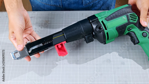 Obraz na plátne Electric collated screw gun for fast drywall installation and construction fastening work