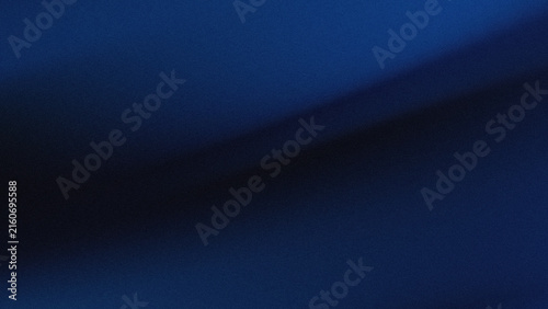 Dark blue fabric texture with soft waves and shadows