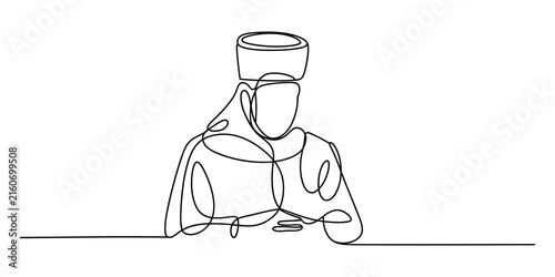 Continuous one line drawing of a man wearing a traditional hat reading a book