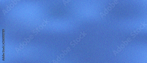 Elegant blue gradient background with soft blurred light effect and fine grain texture for professional design