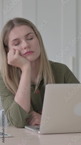 Tired Young Blonde Woman Sleeping at Work, Vertical Video