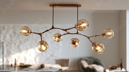 Ornate branching light fixture with amber glass globes in a modern room