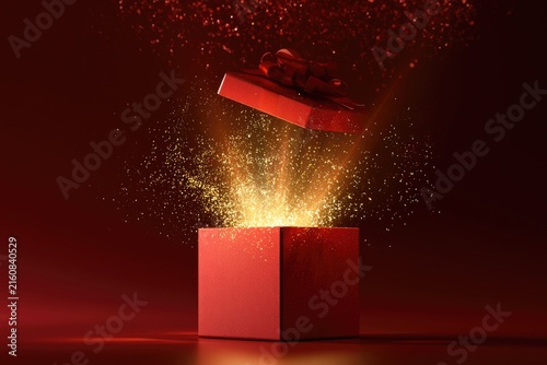 Red gift box opens with bright golden light and sparkling particles erupting upward