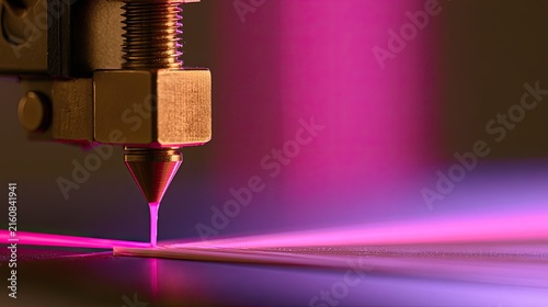 Close-up of a precision instrument creating fine lines with pink light