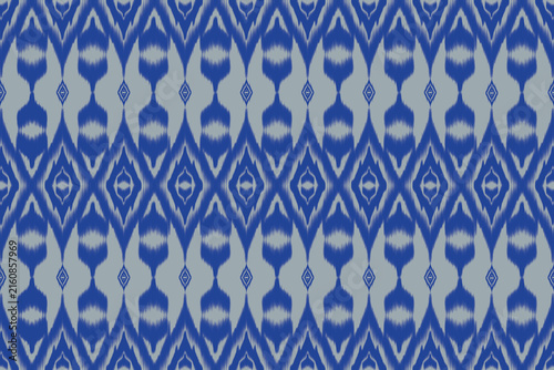 Seamless Ethnic Ikat Geometric Pattern Design with Intricate Diamond Motifs and Traditional Textile Weaves in Blue and Grey
