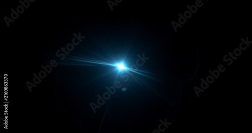 Intense cinematic light flare radiating from a bright source on dark background. Realistic optical effect ideal for film production, visual effects and dramatic compositions.