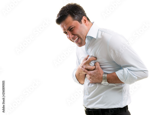 Obraz na płótnie Man clutching his chest in pain demonstrating heart attack or severe chest pain symptoms isolated on white background
