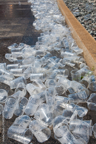 Empty plastic cups litter the road after a running event in Stuttgart