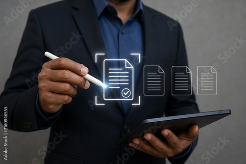 Person using tablet with holographic document and approval icons floating above