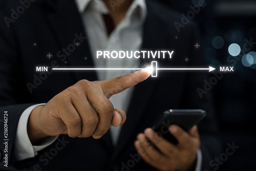 Hand adjusts productivity slider on smartphone with city lights backdrop