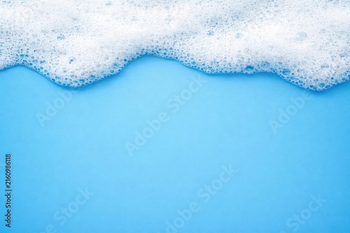 Foamy Ocean Waves on a Light Blue Background