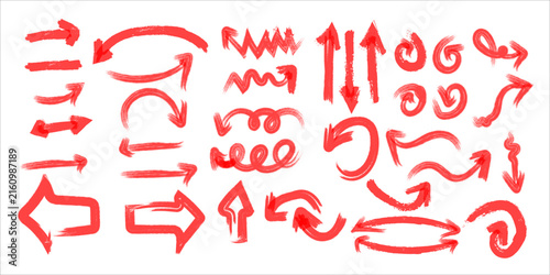 Collection of various hand drawn red arrows and pointers with a textured brush stroke style isolated on white
