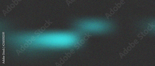 Quadro su tela Vibrant glowing blue light rays emerging from dark atmosphere with grainy textur