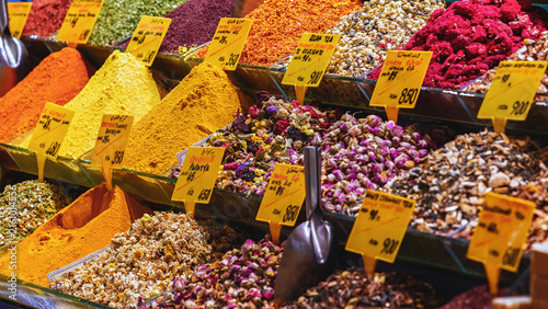 Colorful piles of spices, herbs, dried flowers and culinary ingredients at a food market. Istanbul, Turkiye (Turkey)