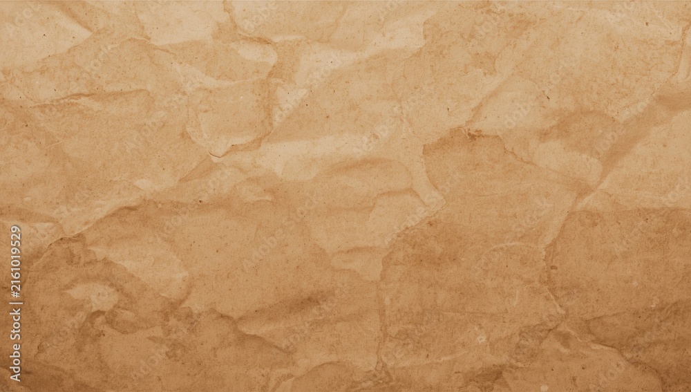 Fototapeta premium Textured Brown Crumpled Paper Background in Warm Tones