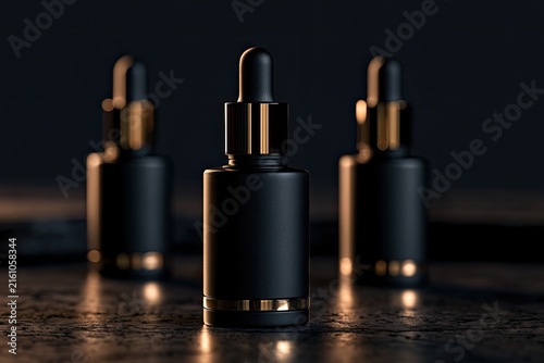 Three elegant black glass dropper bottles with gold accents sit on a textured surface