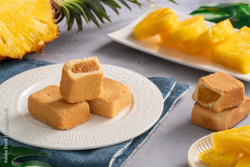 Traditional Taiwanese pineapple cake pastry served on ceramic plate.