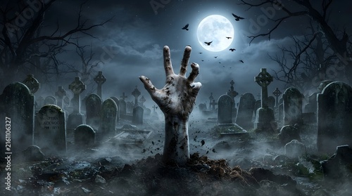 A chilling halloween night scene depicts a ghostly hand emerging from a grave in a misty moonlit graveyard surrounded by ancient tombstones and silhouetted trees