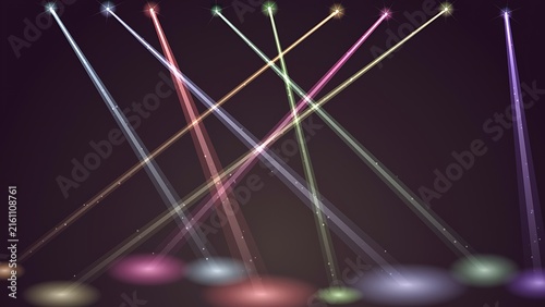 Dynamic stage lighting with crossing multicolored spotlight beams illuminating a dark venue spotlight illumination performance colorful multicolored background lighting entertainment abstract