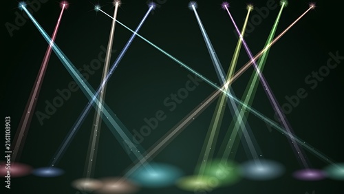 Energetic multicolored laser lights projecting angled beams and glowing circles on dark floor with colorful nightclub spotlight illumination entertainment performance background abstract