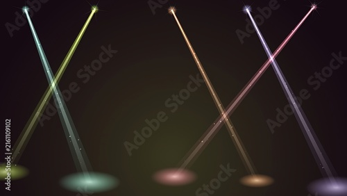 Paired stage spotlights casting crossed colored beams and glowing floor circles on dark backdrop with spotlight background performance illumination brightness entertainment lighting atmosphere