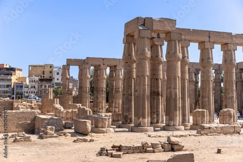 Fotografie Ancient luxor temple columns and ruins under a clear blue, preserving the grande