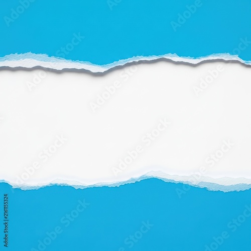 Obraz na płótnie Snow covered mountain range under clear blue sky with clouds reflection