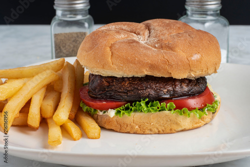 portobello  burger  with lettuce and tomato
