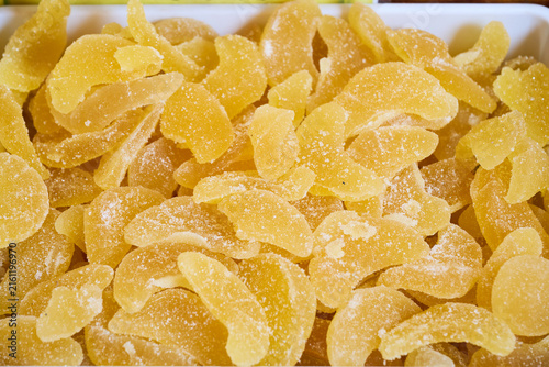 Candied ginger slices displaying a sweet spicy treat
