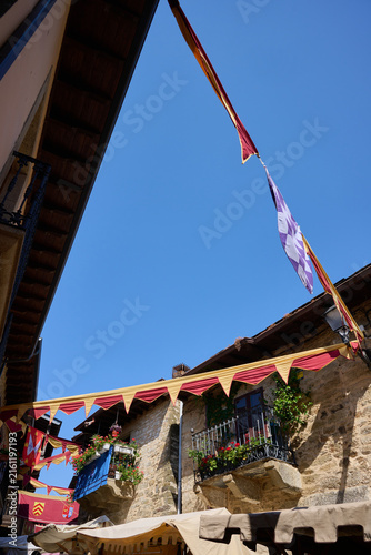 Puebla de Sanabria medieval festival decorations adorning historic street buildings