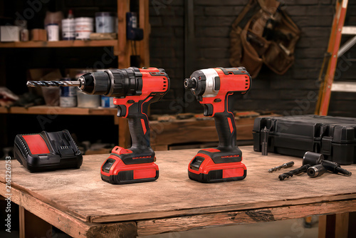 Tools are set on a wooden table in a workshop ready for use during a project