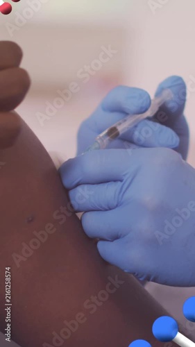 Animation of dna strands over caucasian doctor vaccinating african american patient