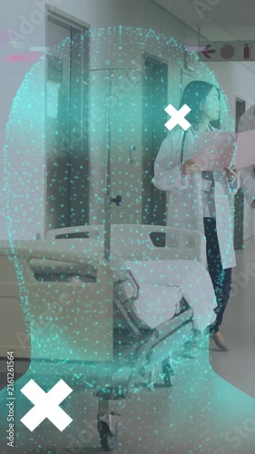 Animation of globe and digital human head over diverse doctors at hospital