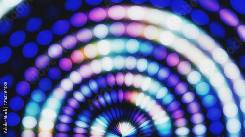 Pulsing vibrant neon bokeh lights in a concentric radial pattern. Elegant and energetic atmosphere for stage design, concert visuals, glamorous events and disco nights.