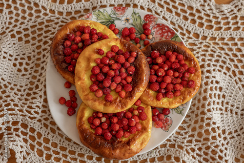 A photo of PP dumplings with fresh strawberries.
