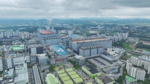Aerial Drone View of Advanced Semiconductor Chip Manufacturing Plant and Industrial Complex in Icheon, South Korea