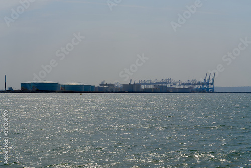 Obraz na plátně Scenic view of English Channel with Port 2000 and oil storage tanks in the background on a summer day