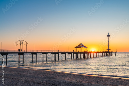 Brighton Beach Jetty at sunset with people silhouettes, Adelaide, South Australia
