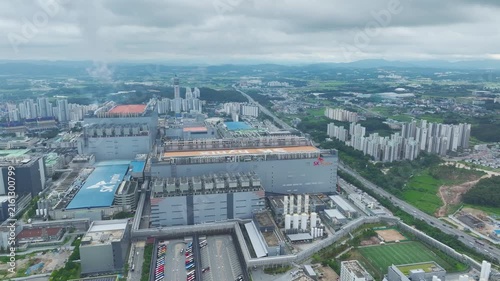 Aerial Drone View of Advanced Semiconductor Chip Manufacturing Plant and Industrial Complex in Icheon, South Korea