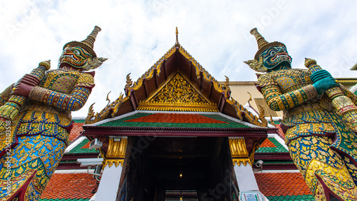 Old giant guardian buddha at Wat Phra Kaew temple of emerald travel