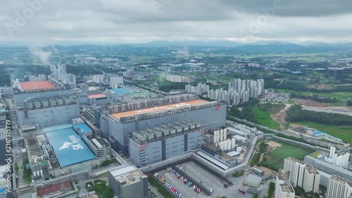 Aerial Drone View of Advanced Semiconductor Chip Manufacturing Plant and Industrial Complex in Icheon, South Korea