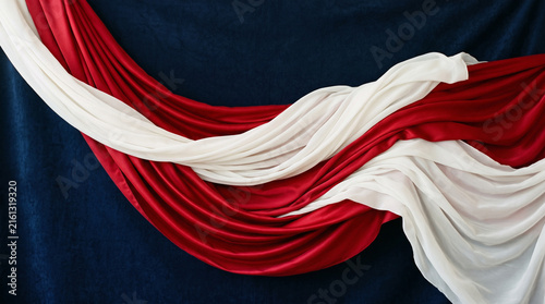 Elegant red white and blue draped fabric background for independence day celebration