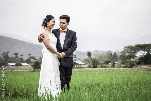 thai people wedding green rice field