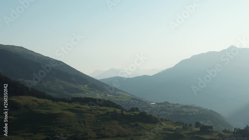 Relaxing aerial view of mountain scenery with sunny conditions, and beautiful natural landscapes.