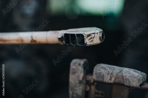 Foto Close-up of muzzle brake on a military gun barrel